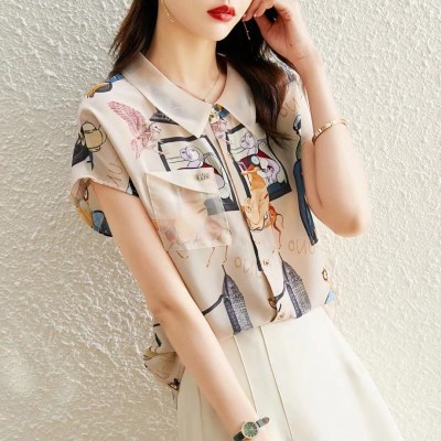 外单短袖衬衣女2022夏季新款宽松显瘦气质翻领设计感印花女式衬衫图3