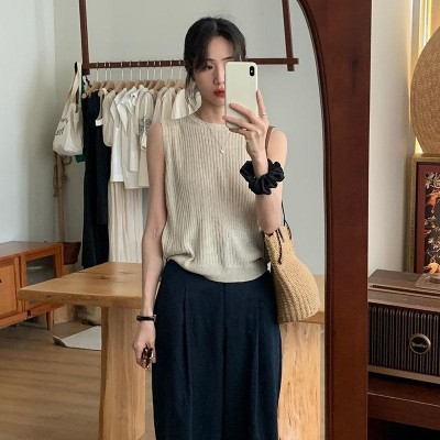 冰丝杏色交叉针织衫女夏季吊带背心女设计感露背洋气显瘦无袖上衣图3